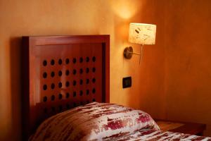 Posteľ alebo postele v izbe v ubytovaní Hotel Ulisse