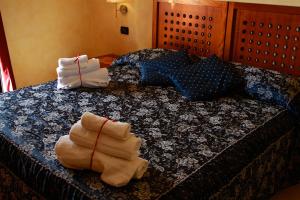 Posteľ alebo postele v izbe v ubytovaní Hotel Ulisse