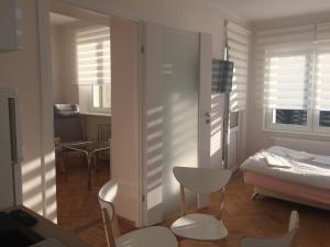 Posteľ alebo postele v izbe v ubytovaní Apartamenty Przy Plaży Gdynia Orłowo