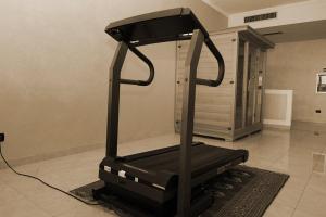 Posilňovňa alebo fitness centrum v ubytovaní Hotel Ulisse