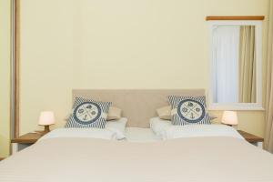 Posteľ alebo postele v izbe v ubytovaní Jantar Apartamenty Exclusive Polanki Park SPA