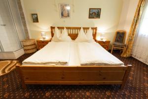 Postel nebo postele na pokoji v ubytování Haus Unterdorf