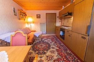 Kuchyň nebo kuchyňský kout v ubytování Haus Unterdorf