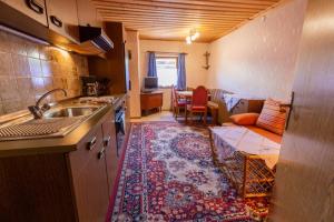 Kuchyň nebo kuchyňský kout v ubytování Haus Unterdorf + 21 fotografií
