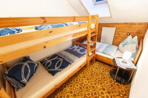 Postel nebo postele na pokoji v ubytování Haus Unterdorf