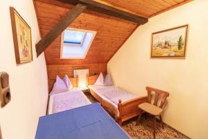 Postel nebo postele na pokoji v ubytování Haus Unterdorf