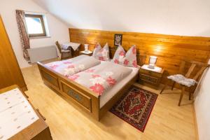 Postel nebo postele na pokoji v ubytování Haus Unterdorf