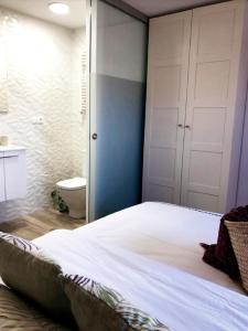 Posteľ alebo postele v izbe v ubytovaní La Casita del Duente - Úbeda