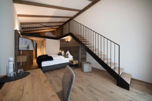 Postel nebo postele na pokoji v ubytování Hotel Stubai