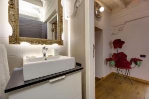 Ванная комната в Capitelli Suite