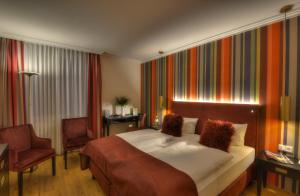 Postel nebo postele na pokoji v ubytování Nells Park Hotel