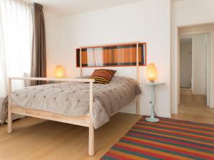 A bed or beds in a room at ATTICO DELLA LATTA