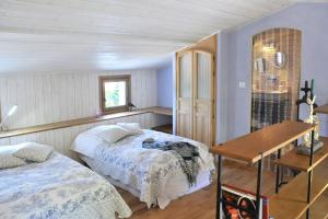 En eller flere senge i et værelse på Une Campagne En Provence