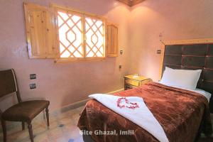 Uma cama ou camas num quarto em Chez Ghazal Imlil
