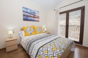 Katil atau katil-katil dalam bilik di Apartamento cerca de Pistas
