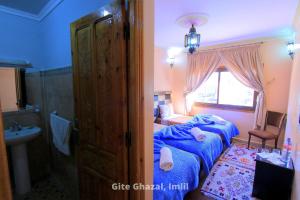 Uma cama ou camas num quarto em Chez Ghazal Imlil