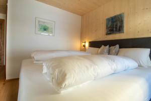 Letto o letti in una camera di Wally Berg-Appartements