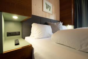 Letto o letti in una camera di Wally Berg-Appartements