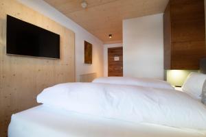 Letto o letti in una camera di Wally Berg-Appartements