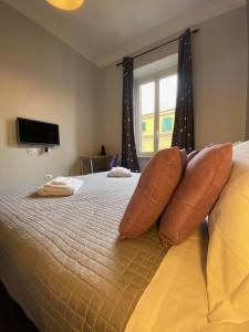 A bed or beds in a room at Guest House Rome by GHOR