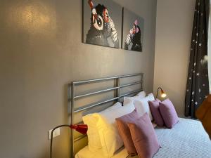 A bed or beds in a room at Guest House Rome by GHOR
