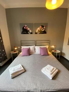 A bed or beds in a room at Guest House Rome by GHOR