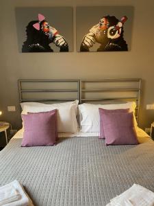 A bed or beds in a room at Guest House Rome by GHOR
