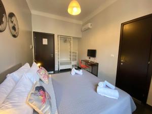 A bed or beds in a room at Guest House Rome by GHOR