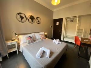 A bed or beds in a room at Guest House Rome by GHOR