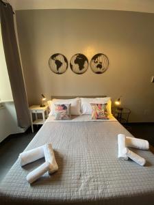 A bed or beds in a room at Guest House Rome by GHOR