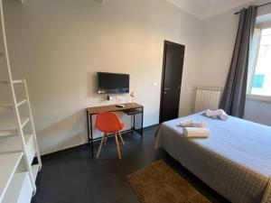 A bed or beds in a room at Guest House Rome by GHOR