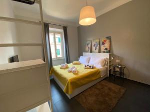 A bed or beds in a room at Guest House Rome by GHOR