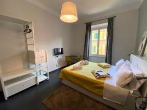A bed or beds in a room at Guest House Rome by GHOR