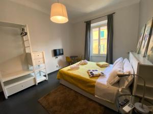 A bed or beds in a room at Guest House Rome by GHOR