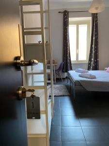 A bed or beds in a room at Guest House Rome by GHOR