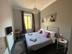 A bed or beds in a room at Guest House Rome by GHOR