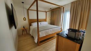 Postel nebo postele na pokoji v ubytování Hotel Secreto