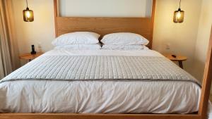 Postel nebo postele na pokoji v ubytování Hotel Secreto