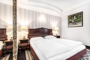 Postel nebo postele na pokoji v ubytování Hotel Windsor w Jachrance + 33 fotografií