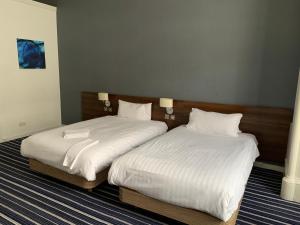 Cama o camas de una habitación en Piries Hotel
