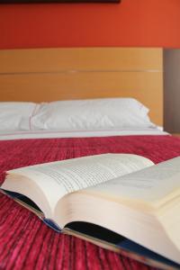Cama o camas de una habitación en Loop INN Hotel Santiago de Compostela