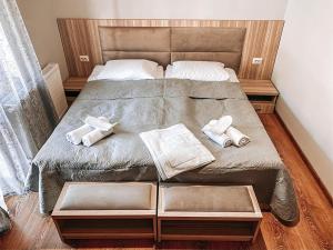 Letto o letti in una camera di Hotel panorama svaneti