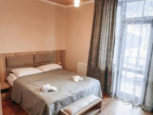 Letto o letti in una camera di Hotel panorama svaneti