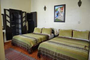 Voodi või voodid majutusasutuse Hotel Cap Sim toas