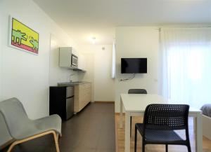 TV a/nebo společenská místnost v ubytování MozÁrt Bed & Breakfast - Affittacamere
