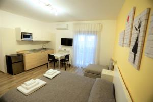 TV a/nebo společenská místnost v ubytování MozÁrt Bed & Breakfast - Affittacamere