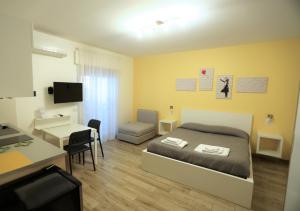 Postel nebo postele na pokoji v ubytování MozÁrt Bed & Breakfast - Affittacamere