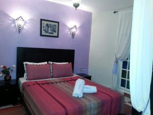 Voodi või voodid majutusasutuse Hotel Cap Sim toas