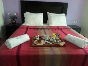 Voodi või voodid majutusasutuse Hotel Cap Sim toas
