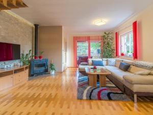 a living room with a couch and a table at House Toni for 8 persons in Briševo